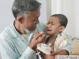 Miles away from home helpless father struggles to save son from cancer