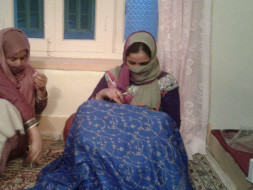 Helping kashmiri women artisans for attending International Trade Fair