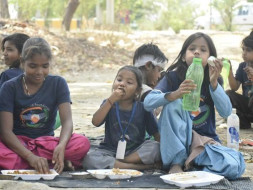 Help us feeding hungry children from slums