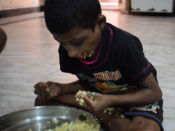 Serve Food For Homeless People And Mentally Challenged Orphanage Kids
