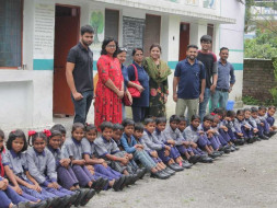 "NAVV SHIKSHA"Providing shoes,bag,story book,sweater etc to students