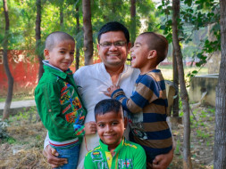 Support this teacher to bring up 14 HIV+ children
