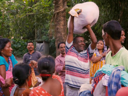 Support Saju Talukdar to distribute new and warm clothes