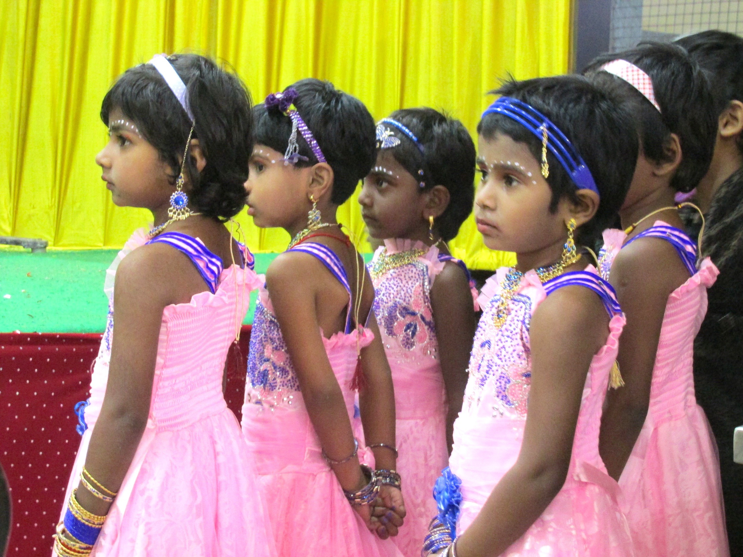 3rd standard girls  patiently waiting their turn