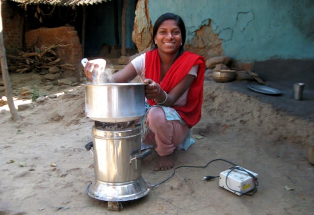 Borrower with cookstove in Muniguda