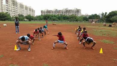 Kids doing warm up before a football match.