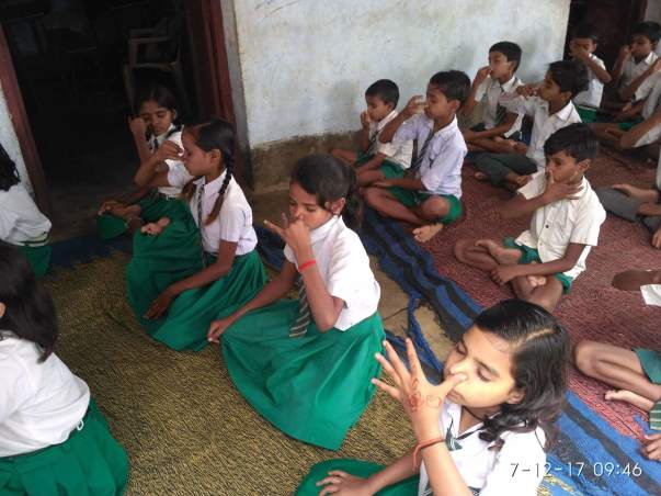 little school kids doing pranayam in yoga camp conducted by me