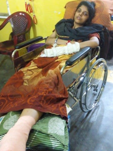 Hrudhaiyalakshmi in the folding chair, bought to her with the help of the funds raised.