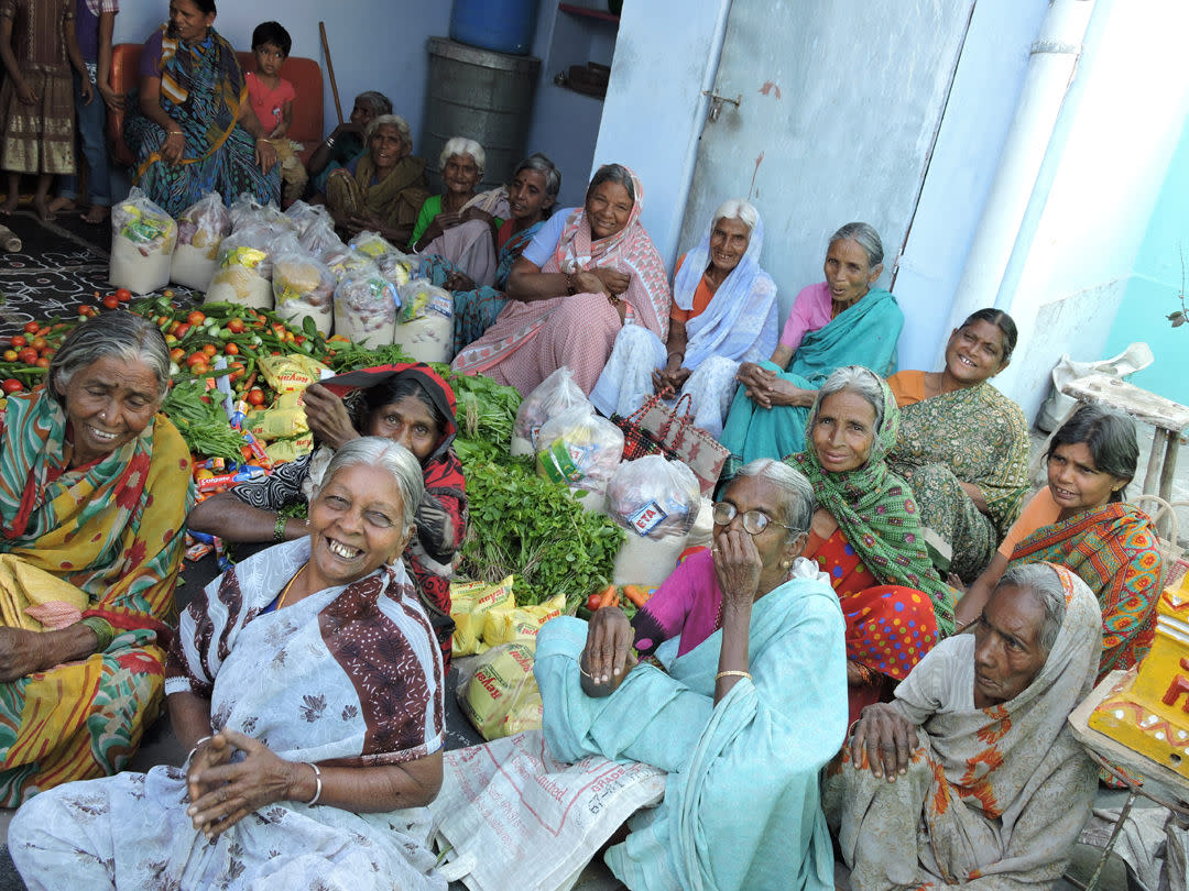 Elderly_Persons_getting_food_sponsorship_from_NGO_in_India