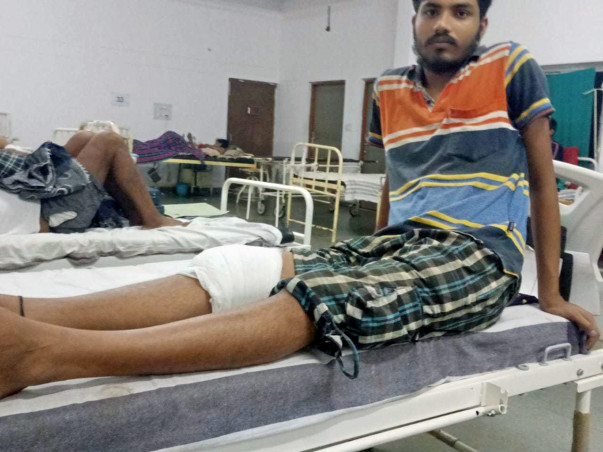 Help them He has a broken leg in an accident