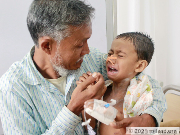 Miles away from home helpless father struggles to save son from cancer