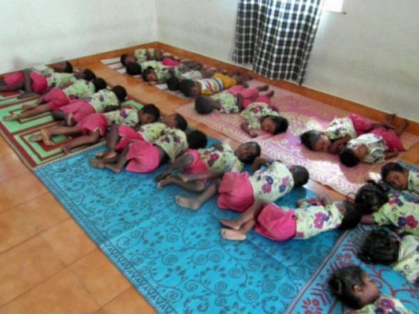 Gift beds,books & bags to our Hostel Children
