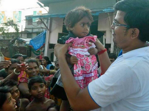 Clothes Distribution Among 4000 Needy Persons During Durga Puja