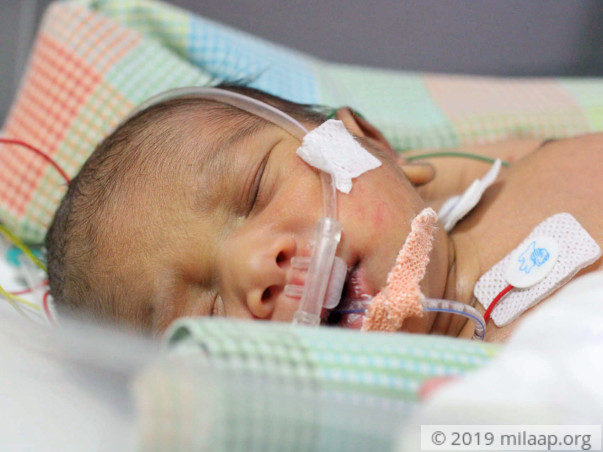 Flower seller needs our help to save his newborn baby