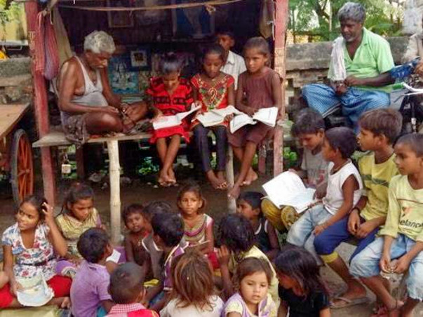 Helping the Poor Boy learn to read the Girls
