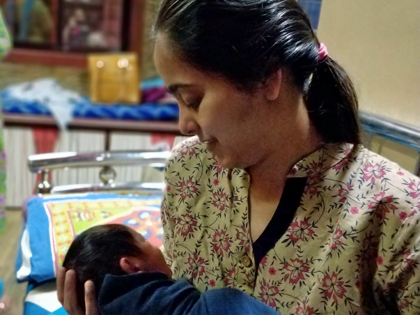 A Mother of one year old son is Fighting with Cancer