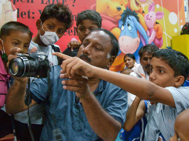 Help This Partially Deaf Photographer Bring Joy To Kids With Cancer