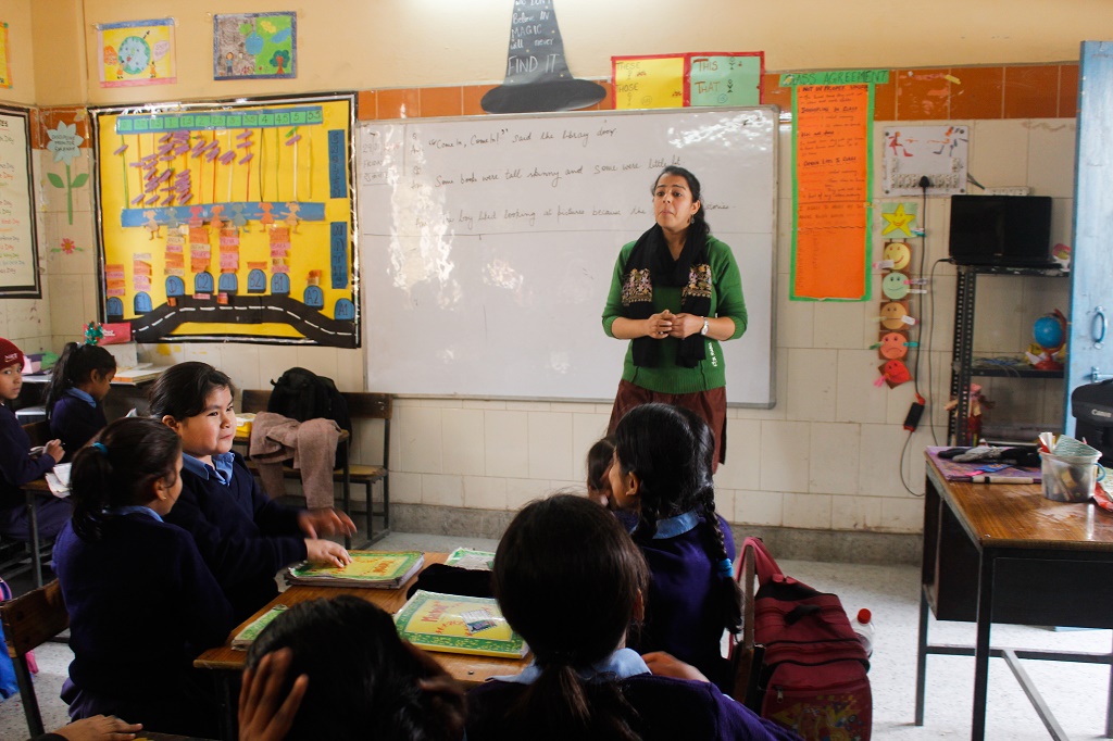 Priya teaching her students Priya teaching her students
