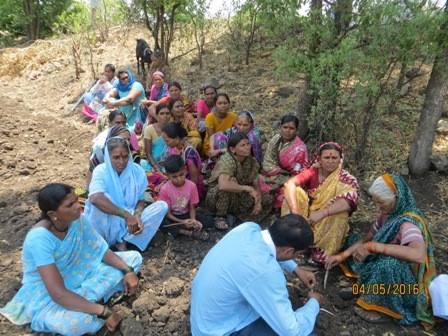 A view of meeting near the drinking water well with the village community